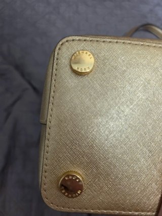 Bolso y cartera Michael Kors dorados