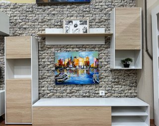 Mueble salón blanco y cambria