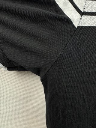 Polo Lacoste Rayas Negro y Blanco