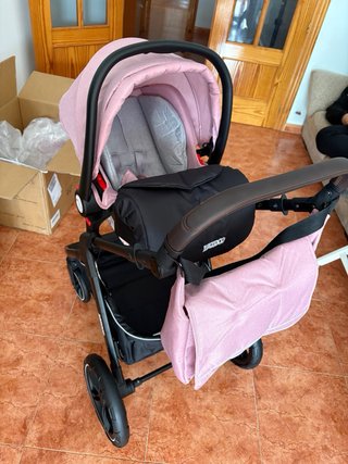 Cochecito bebé rosa y capazo