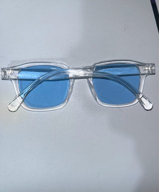 Gafas de sol marco transparente cristales azules