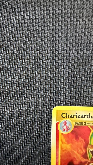 Carta Pokémon Charizard Nv.76 Frente tormentoso