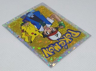 Cromo Ash S29 Pokemon Merlin 1999