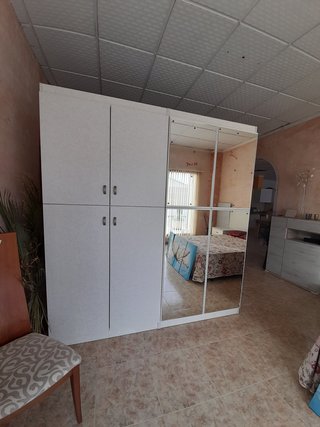 Dormitorio completo con armario