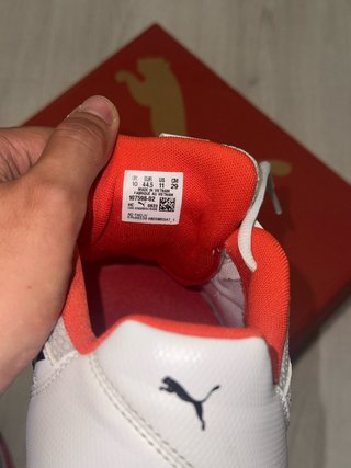 Zapatillas de pádel Puma blancas y rojas