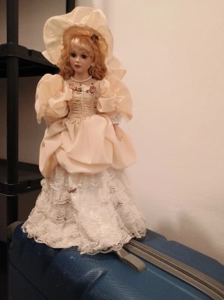 Muñeca de porcelana vintage