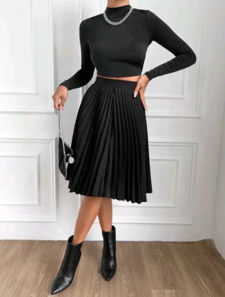 Falda plisada negra midi