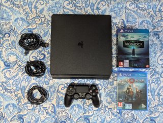 PS4 Slim Nera + 2 Giochi: God of War, Bioshock