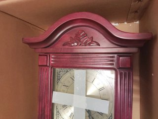 Reloj de pared antiguo de madera