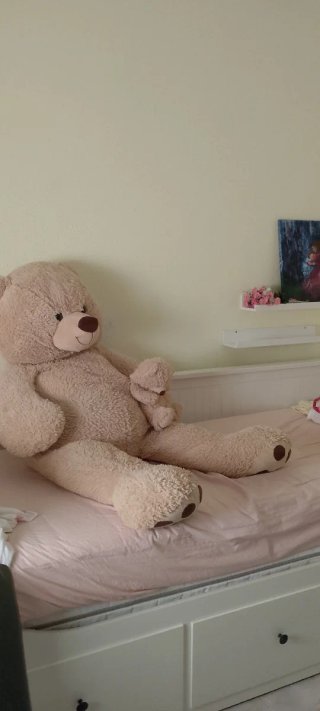 Oso de peluche grande con bebé