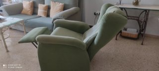Sillón reclinable verde tela