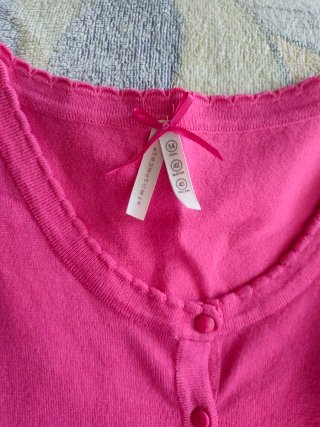 Blusa rosa de punto con botones
