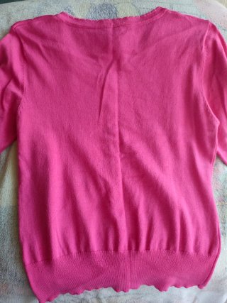 Blusa rosa de punto con botones