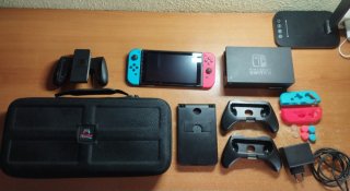 Grande confezione Nintendo Switch. Molti accessori