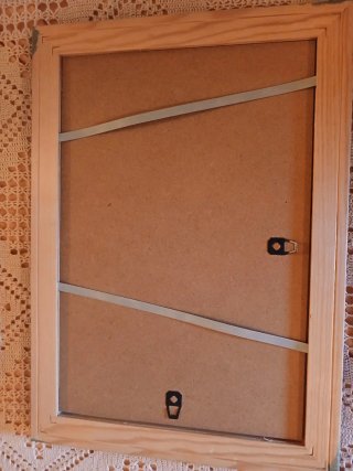 Cornici in legno blu e verdi