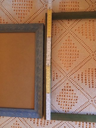 Cornici in legno blu e verdi