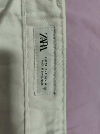 Conjunto Zara: shorts blancos y chaleco verde