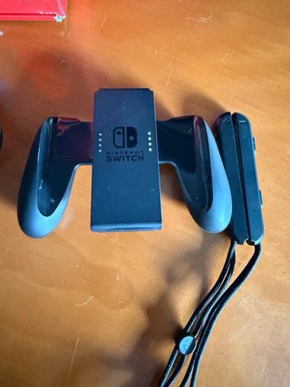 Nintendo Switch como nueva, sin uso con dos juegos