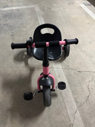 Triciclo rosa para niña