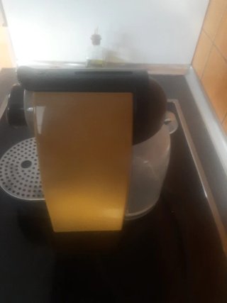 Macchina da caffè Nespresso dorata