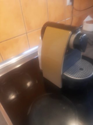 Macchina da caffè Nespresso dorata