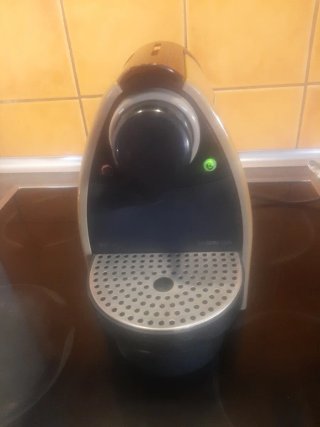 Macchina da caffè Nespresso dorata