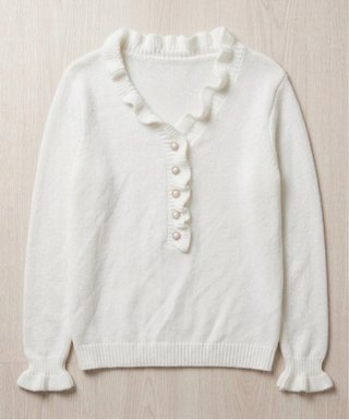 Jersey blanco con volantes y botones