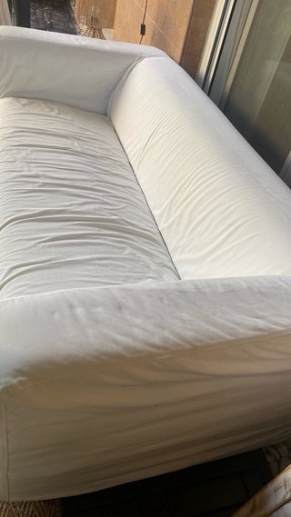 Dos sofas desenfundables del ikea verde y blanco