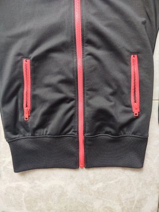 Chándal Nike Negro con Detalles Naranja