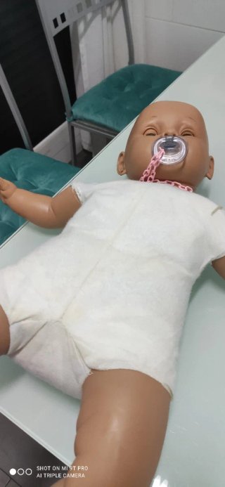 Muñeca bebé 60 cm con chupete