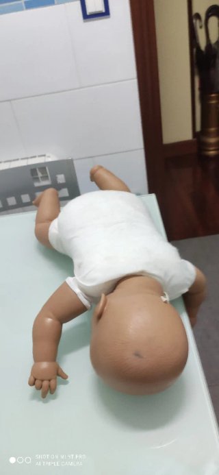 Muñeca bebé 60 cm con chupete