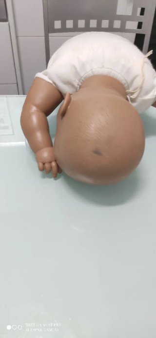 Muñeca bebé 60 cm con chupete