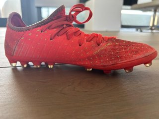 Botas de tacos Puma Naranja y detalles Amarillo