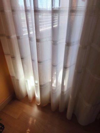 Cortinas confeccionadas y riel.
