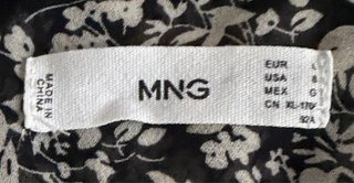 Blusa Mango floral negra y blanca