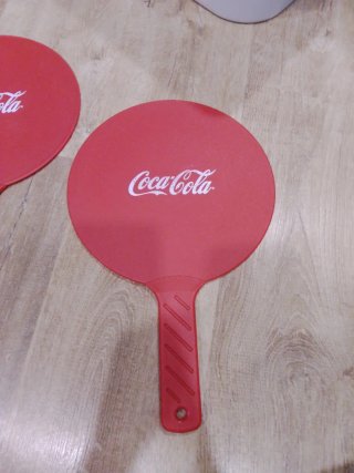 Palas de playa Coca-Cola rojas