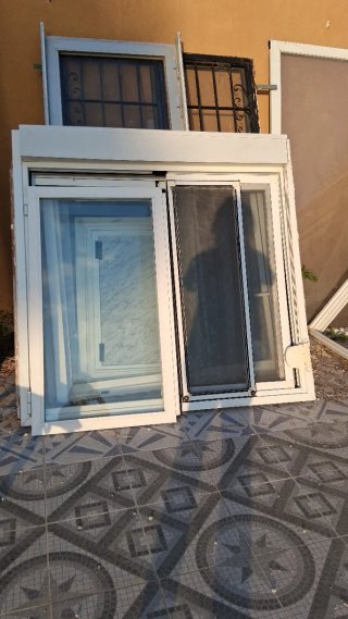 Ventana corredera con mosquitera