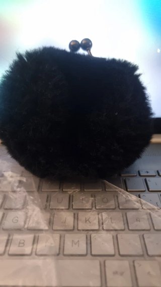 Monedero peluche suave cuqui