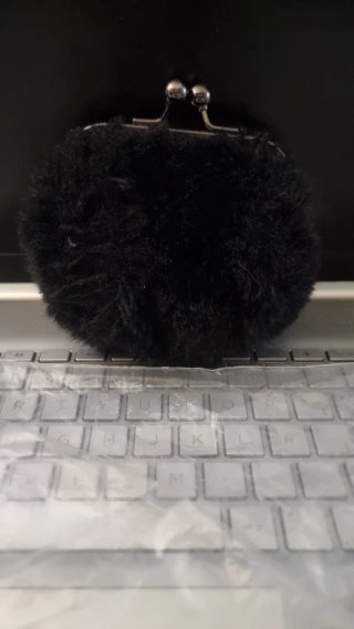 Monedero peluche suave cuqui
