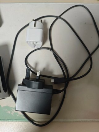 Cargador Switch UK + Adaptador Europeo