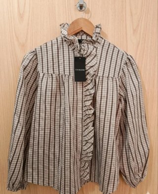 Blusa Sfera con etiqueta