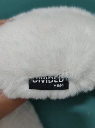 Orejeras de pelo blanco