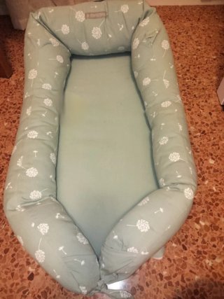Nido bebé con estampado de diente de león