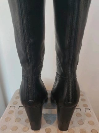 Botas altas Prada piel negras