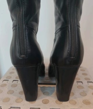 Botas altas Prada piel negras