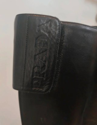 Botas altas Prada piel negras