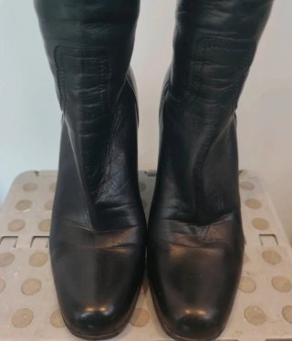 Botas altas Prada piel negras