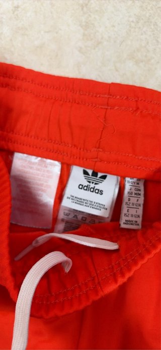 Chaqueta y chandal Adidas Naranja.