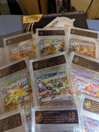 Carte Pokémon 9 pezzi Eevee evoluzioni prismatiche