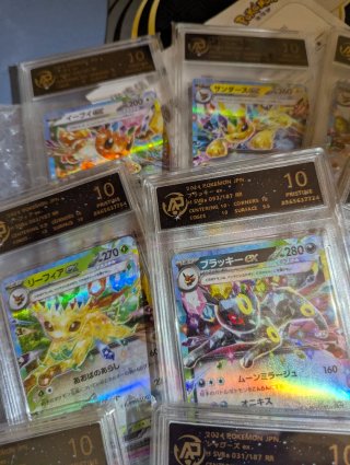 Carte Pokémon 9 pezzi Eevee evoluzioni prismatiche